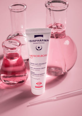 IsisPharma applying cream to cheek offering targeted redness relief