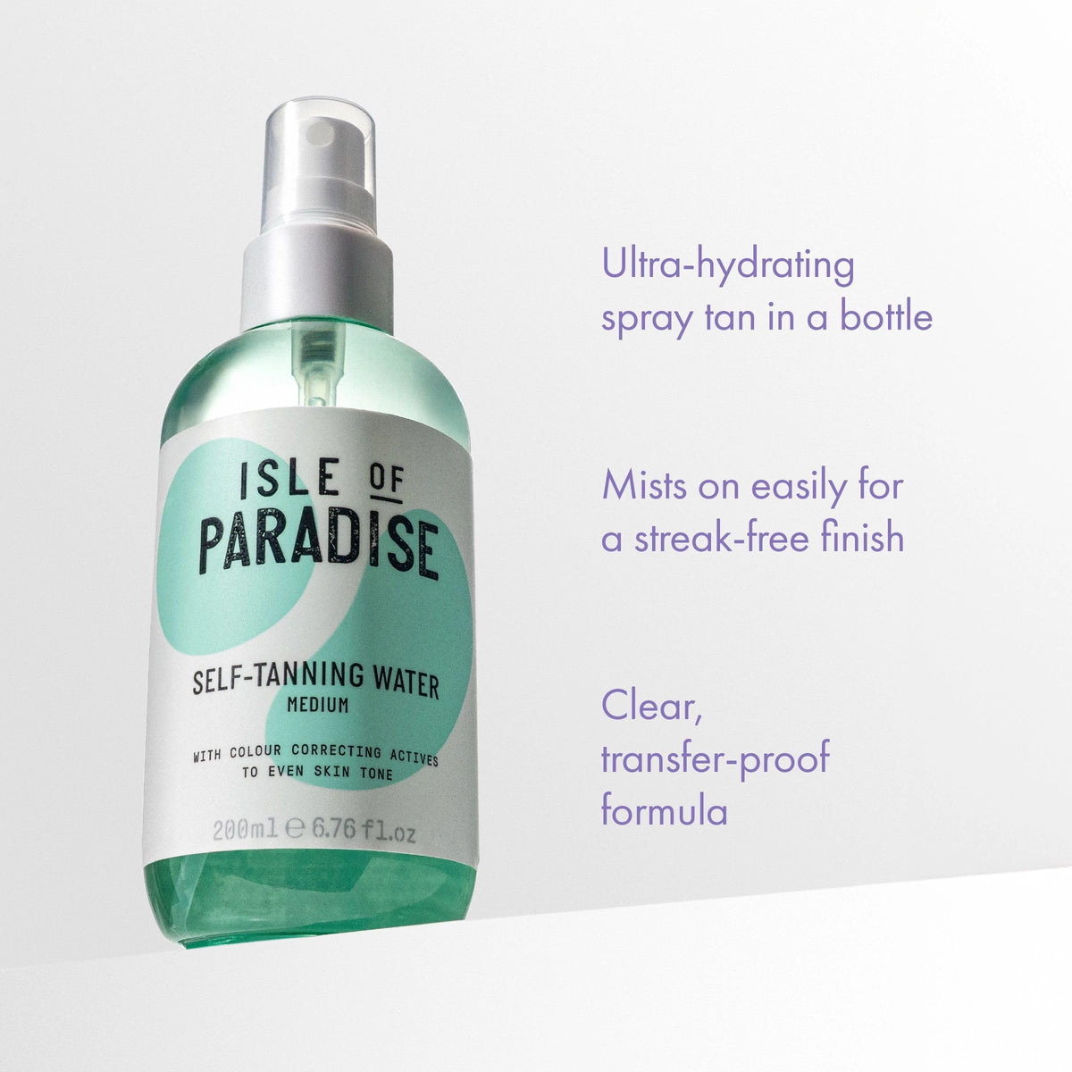 Isle of Paradise application with mitt ensuring streak-free result