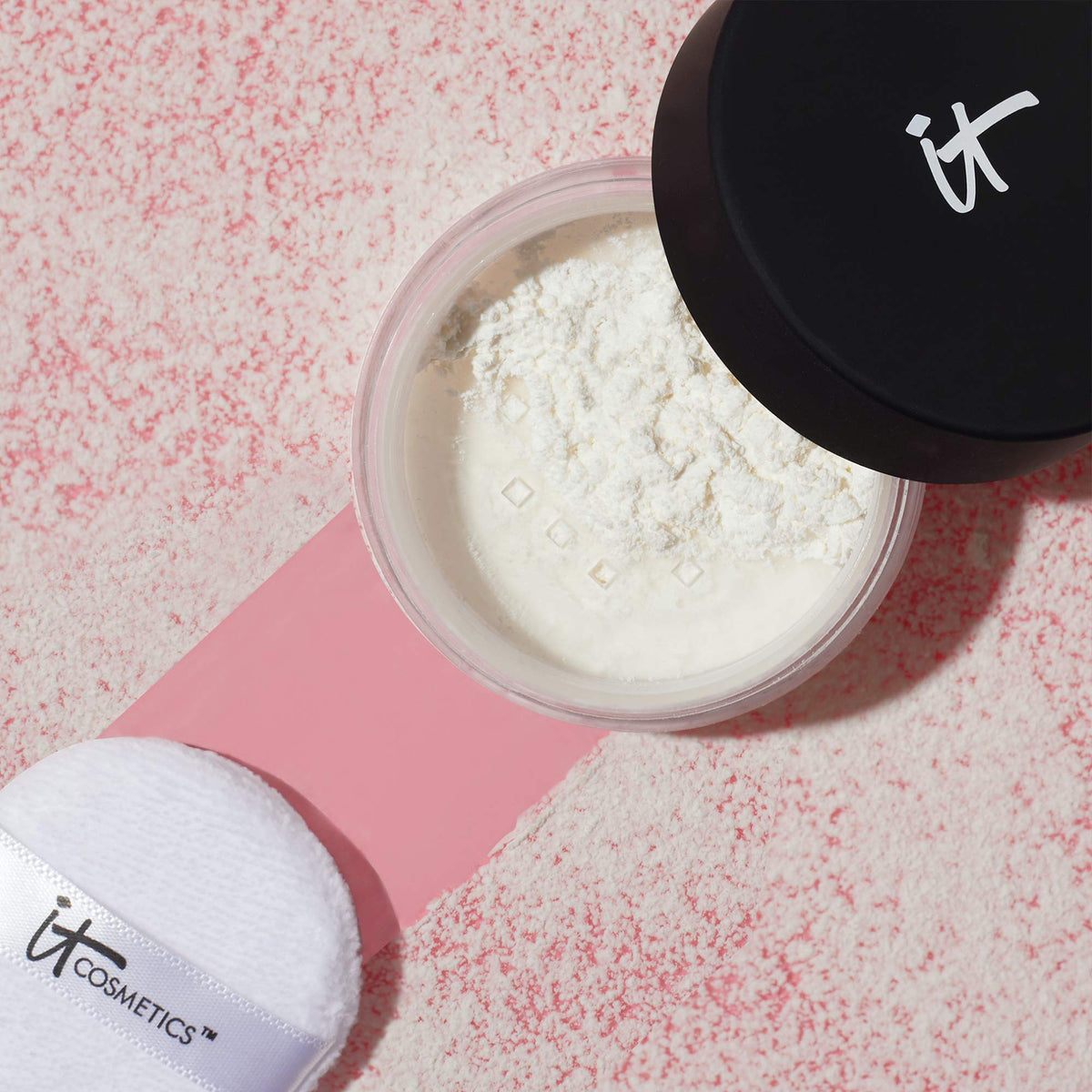IT Cosmetics jar on vanity styled with mirror to show everyday blurring benefits