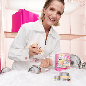 IT Cosmetics Confidence in an Eye Cream beside a coin to show compact travel size