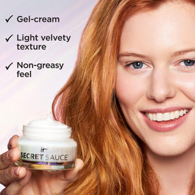 IT Cosmetics moisturizer being applied on hand demonstrating smooth absorption