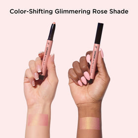 IT Cosmetics swatch of Glimmering Rose on forearm showing rose-gold pearl payoff