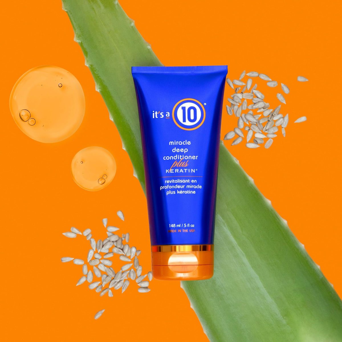 It's A 10 Miracle Deep Conditioner applying to hair mid-lengths for smoother manageability