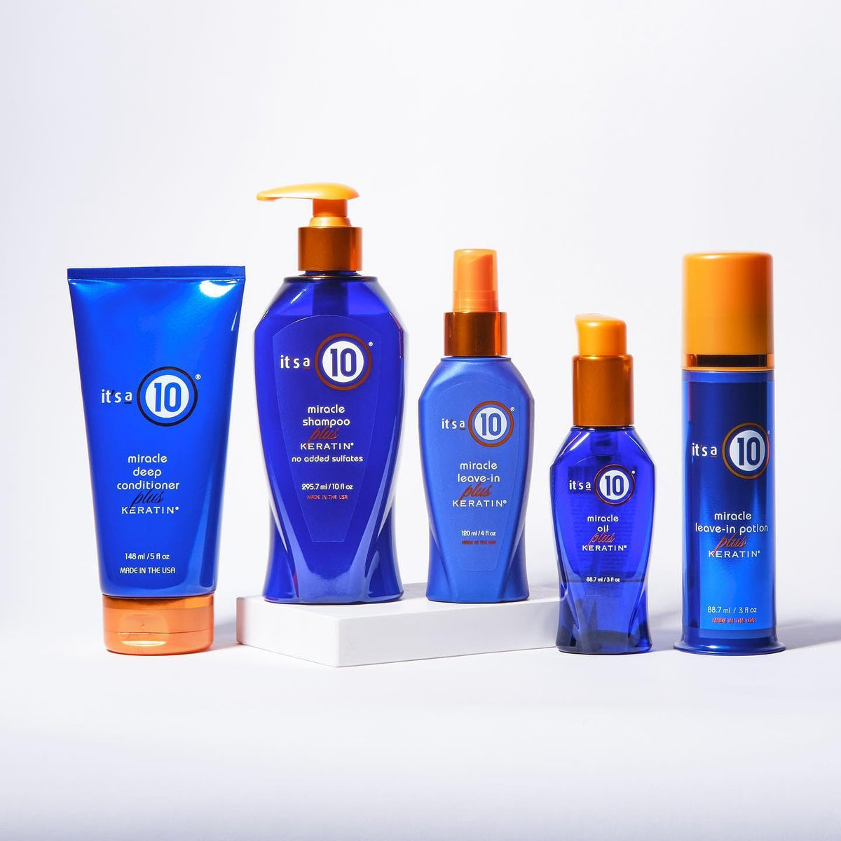It's a 10 leave-in spray in hand showing detangling and heat protection