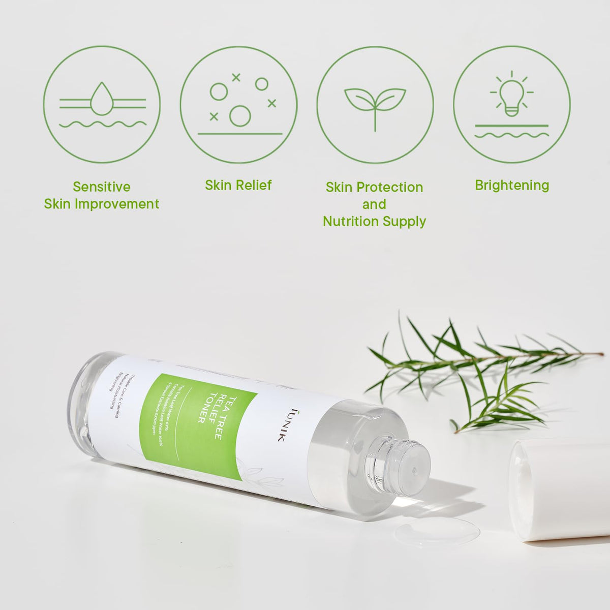 IUNIK bottle beside centella leaves showing botanical ingredients and soothing comfort