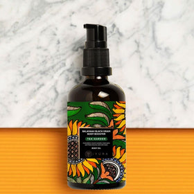 The Ayurveda Experience Balaayah oil pouring to show fast-absorbing texture and glow