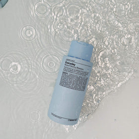 J Beverly Hills shampoo pouring texture highlighting smooth lather and easy application benefit