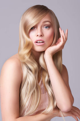 Argan and coconut ingredients staged with bottle, J Beverly Hills nourishing oil benefits