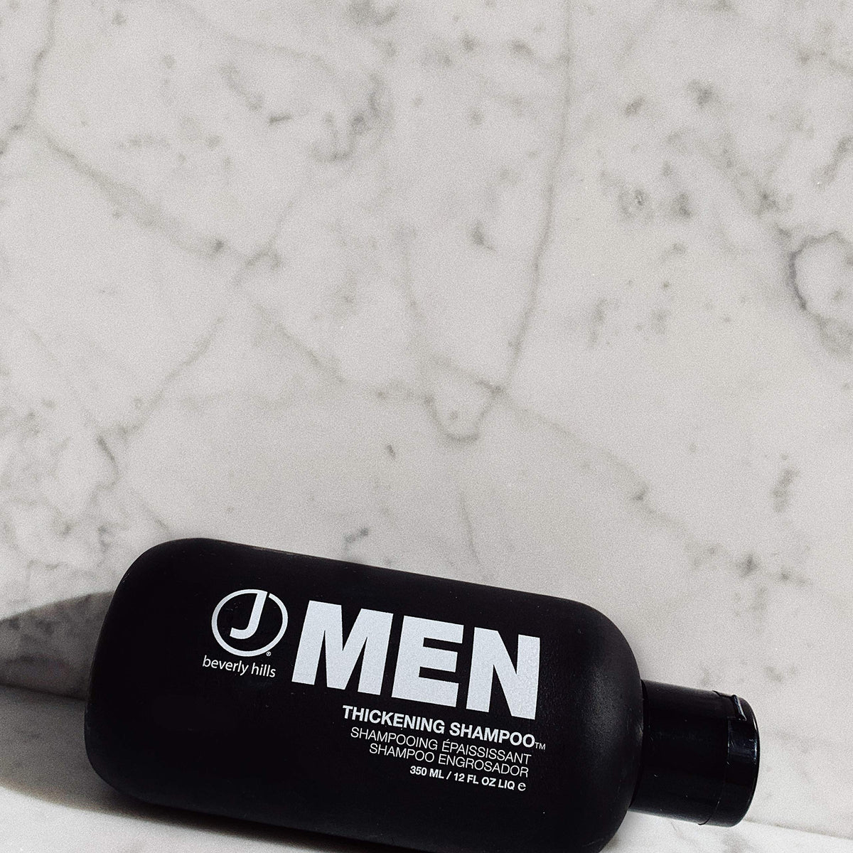 J Beverly Hills shampoo in shower showing easy application and scalp benefit