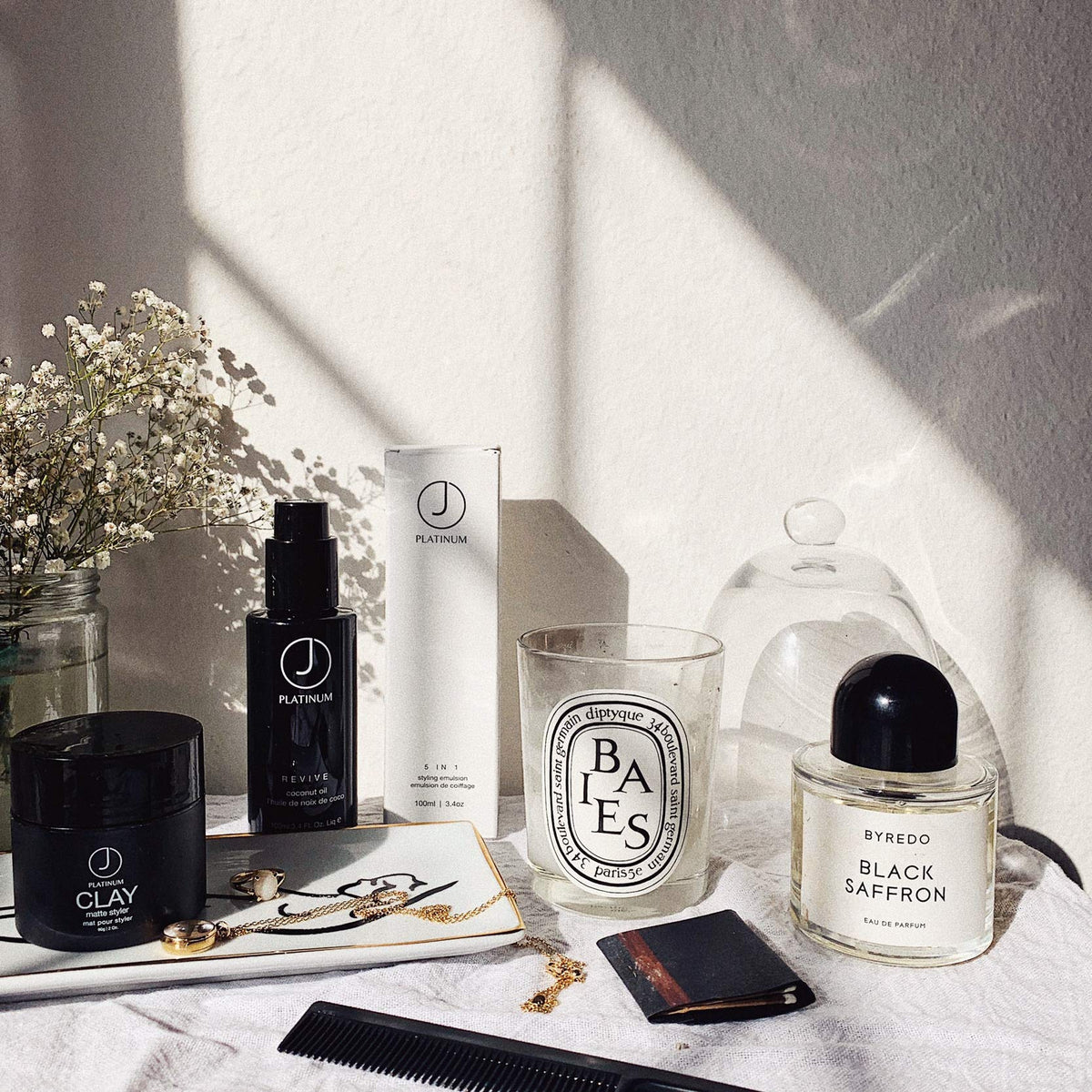 J Beverly Hills travel size on counter showing compact 3.4 oz for on-the-go styling