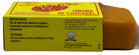 JABON DE ACEITE VIBORA DE CASCABEL next to ruler for clear weight and scale reference