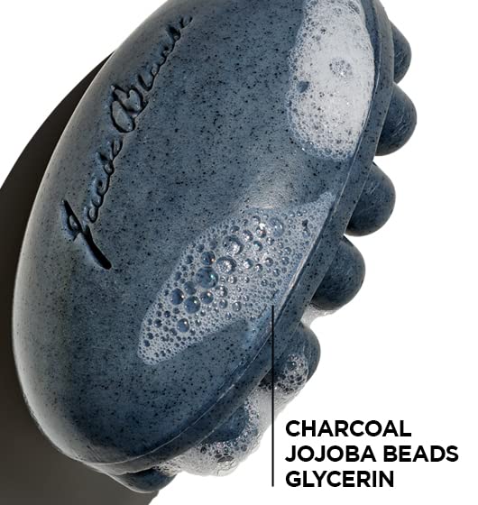 Jack Black charcoal body bar in-use in shower delivering massage and thorough cleanse