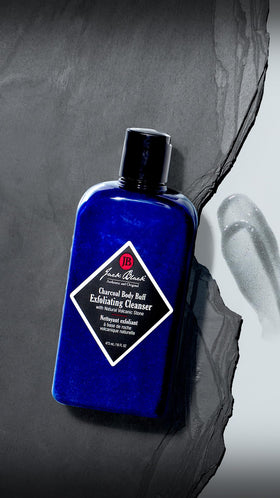 Jack Black product lathered on wet skin in shower, shows deep-cleaning and refreshing result