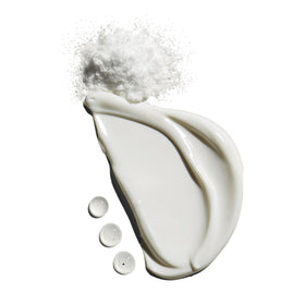 Jack Black moisturizer applied on hand illustrating quick-absorb benefit
