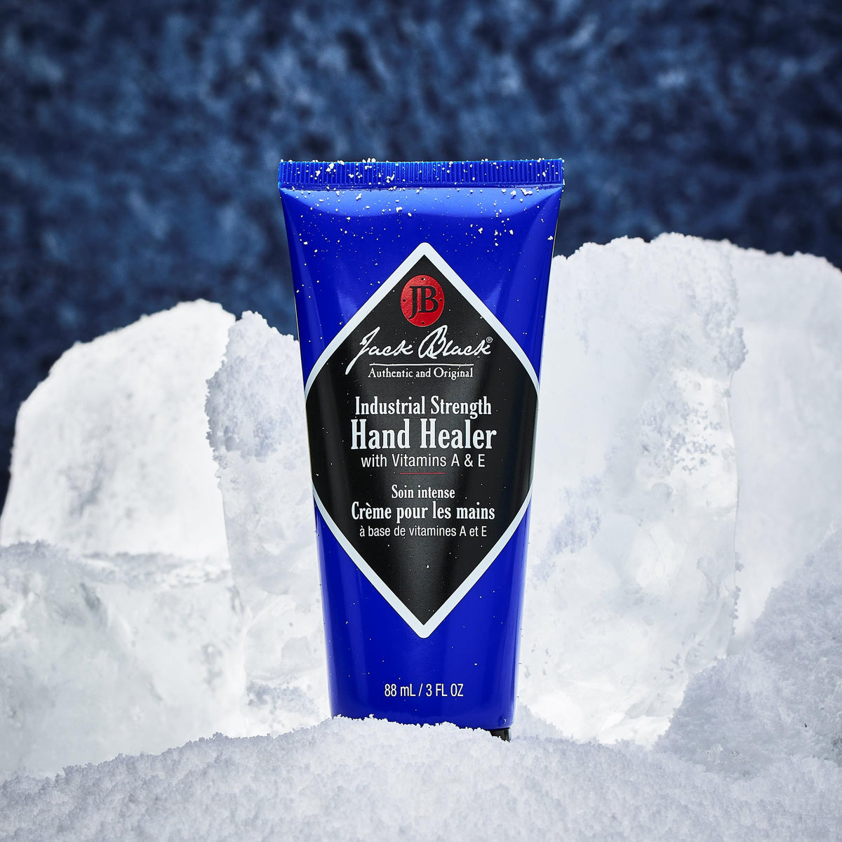 Jack Black hand healer on workbench lifestyle shot for durable hands and quick absorption