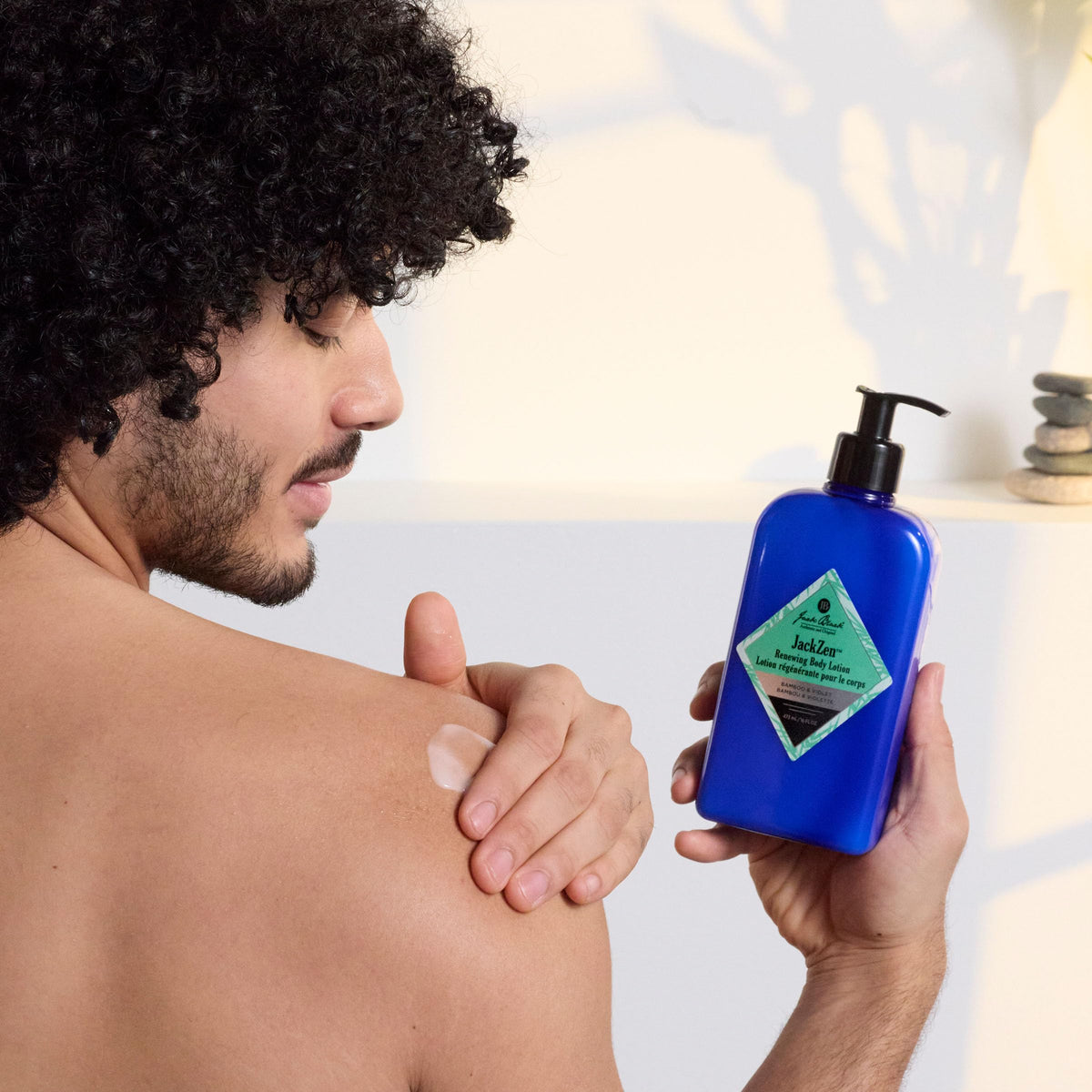 Jack Black Jackzen ingredient oils display with macadamia and jojoba for nourishing hydration