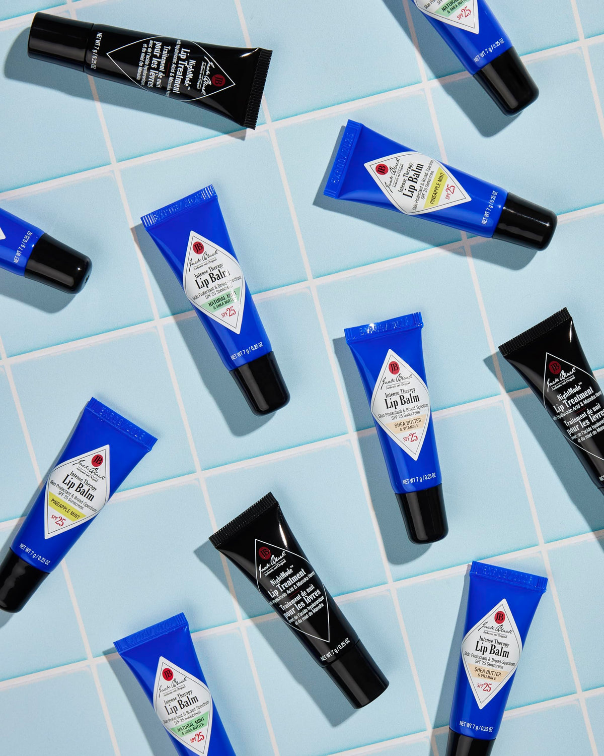Jack Black lip balm next to keys showing compact travel size and on-the-go protection