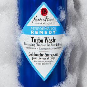 Jack Black Turbo Wash label close-up showing key botanical ingredients and benefits