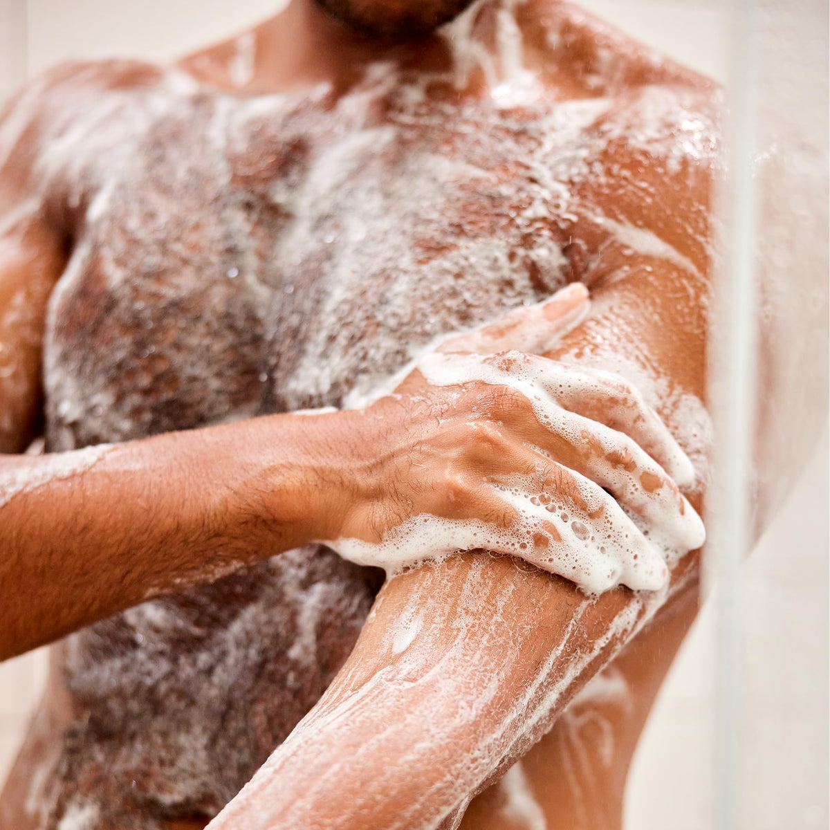 Jack Black Turbo Wash creamy lather texture showing gentle foam for hair and body