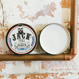 Jack The Barber jar on bathroom counter in lifestyle scene for everyday grooming benefit