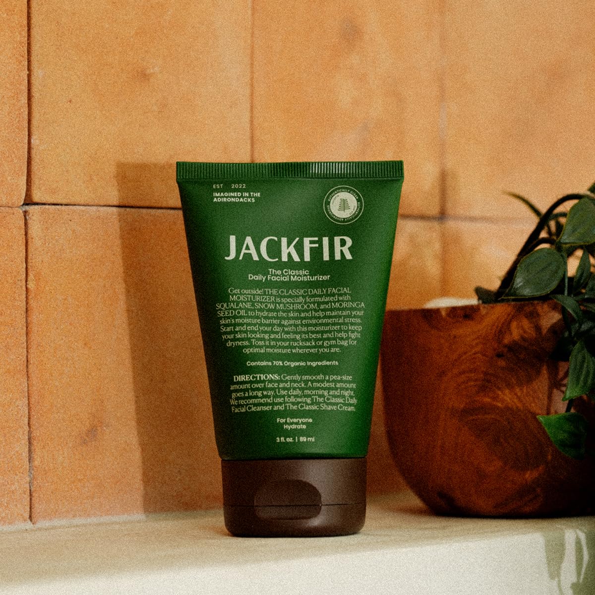 Jackfir tube beside ruler to show 3 fl oz size and lasting value