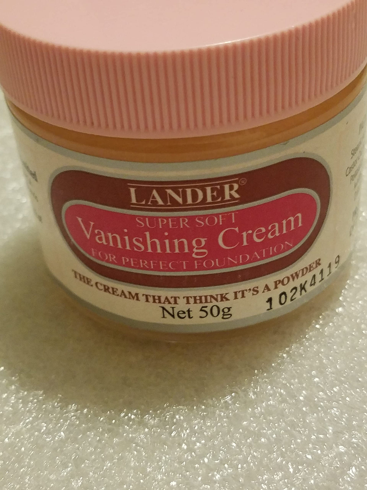 Jamaican Lander cream texture closeup demonstrating smooth blendability and soft finish