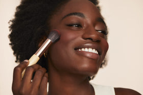 jane iredale applied on model cheeks demonstrating natural glow and lifted cheekbones benefit