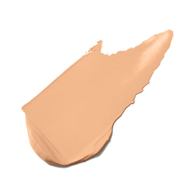 jane iredale product on applicator spoon demonstrating buildable coverage benefits
