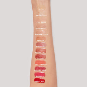 jane iredale size comparison with tube beside lipstick to show portable 0.17 fl. oz. convenience