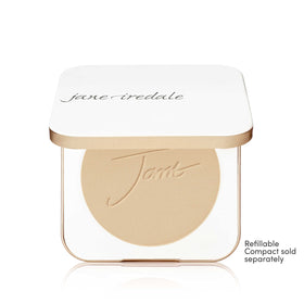 jane iredale applying powder with brush for buildable coverage benefit