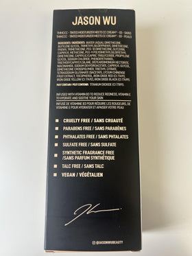 JASON WU fingertip blending product on cheek showing quick, natural-looking application