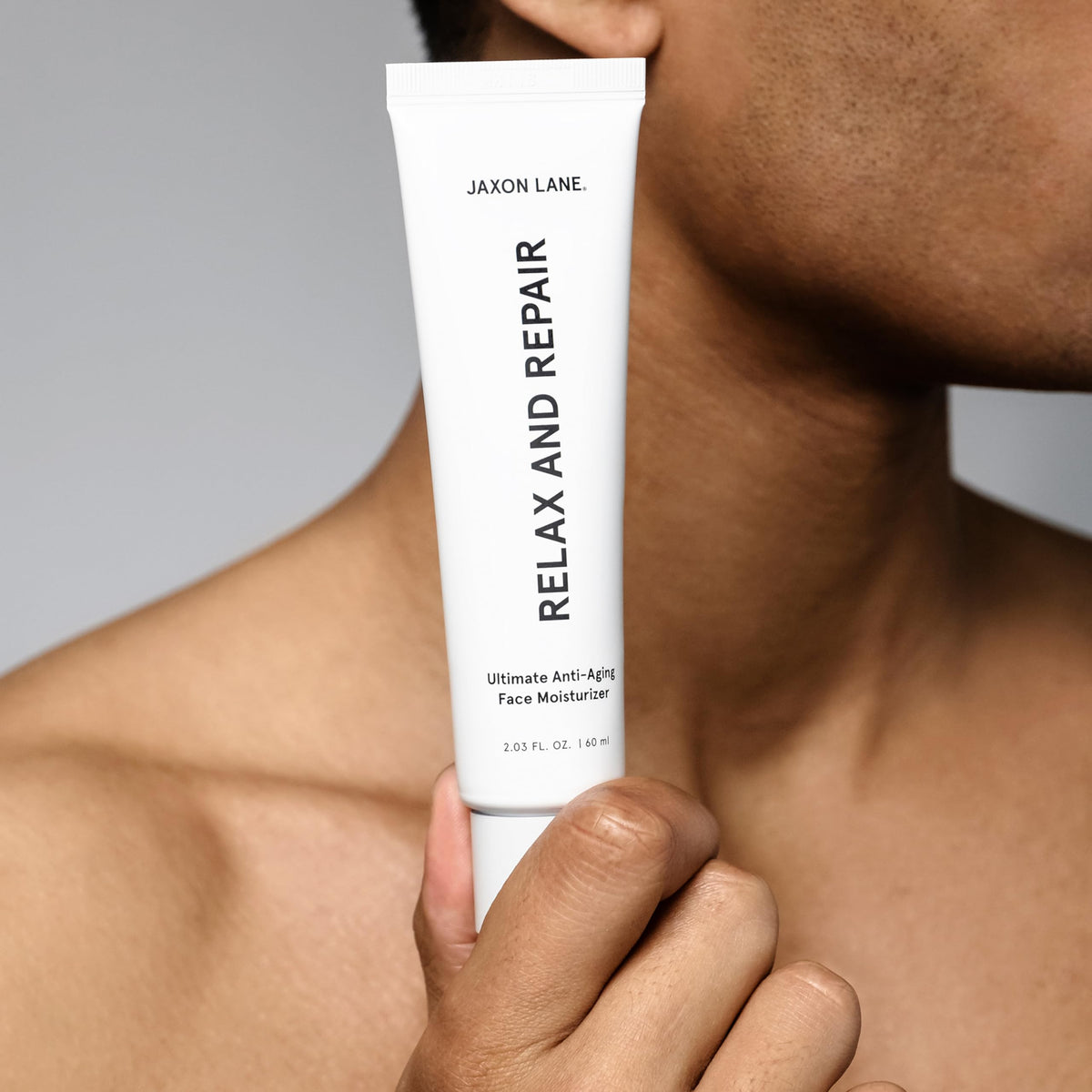 JAXON LANE pump dispensing moisturizer onto hand for quick application