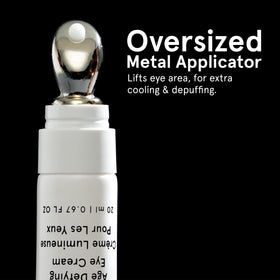 JAXON LANE being applied under eye with metal tip to reduce puffiness