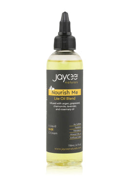 Jaycee Naturals kit next to a phone for travel-friendly size comparison