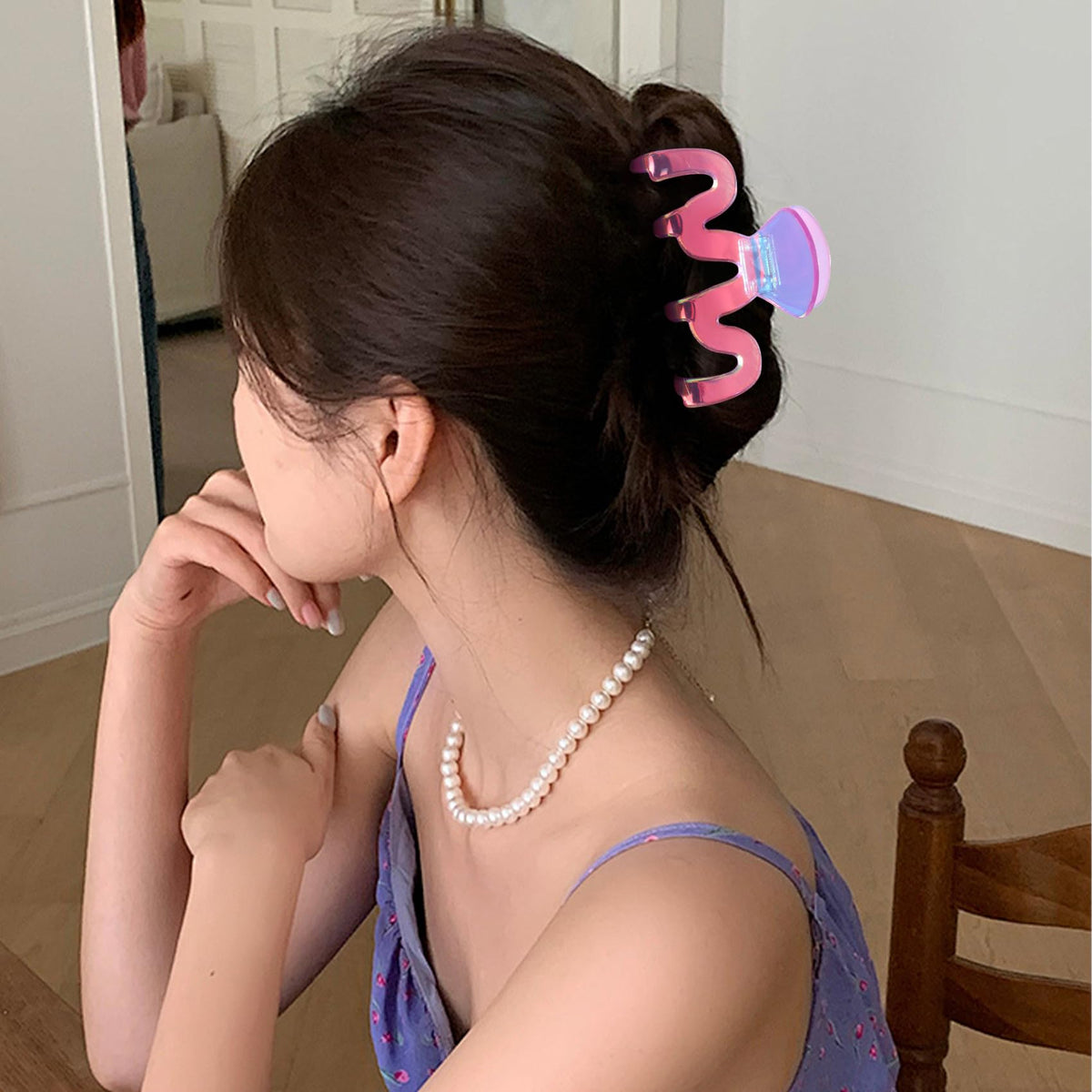 Jayongnee purple clip styled in an updo for a polished Y2K accent