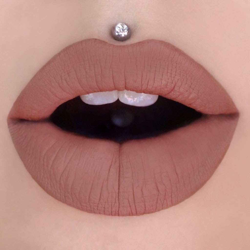 Jeffree Star product next to ruler showing 0.19 fl oz size and portability