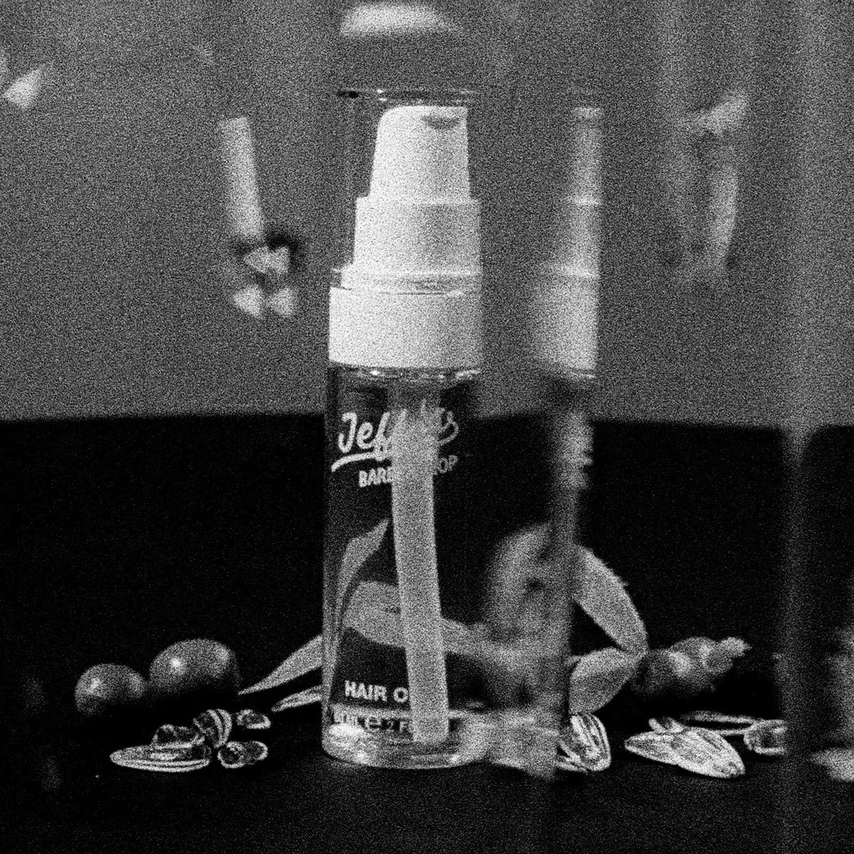 Jeff's Barbershop used with hair dryer illustrating heat protection while styling
