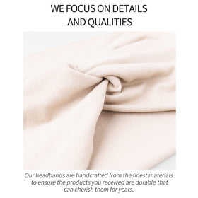 Jesries headband next to hand to show size and comfortable width