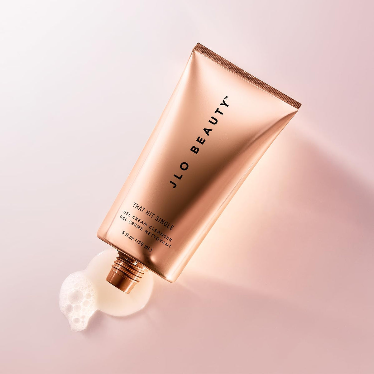JLO BEAUTY product in hand demonstrating application and spreadability