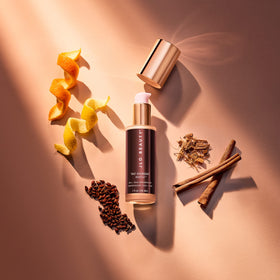 JLO BEAUTY staged pillow nighttime setting conveying overnight renewal benefit