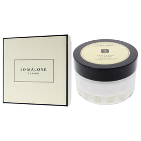 Jo Malone crème next to matching cologne for scent layering and longer wear