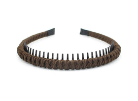 JOBAND headband held in hand showing compact size and control