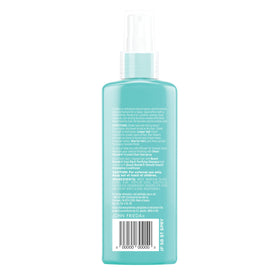 John Frieda being applied with diffuser for lifted, defined beach waves