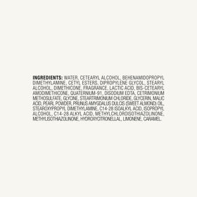 John Frieda on bathroom shelf styled for everyday care and aesthetic benefit