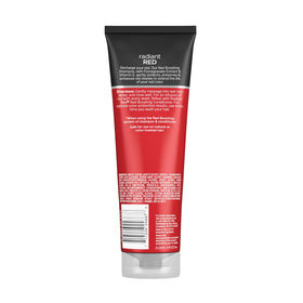 John Frieda product styled with red-haired model emphasizing glossy, styled results