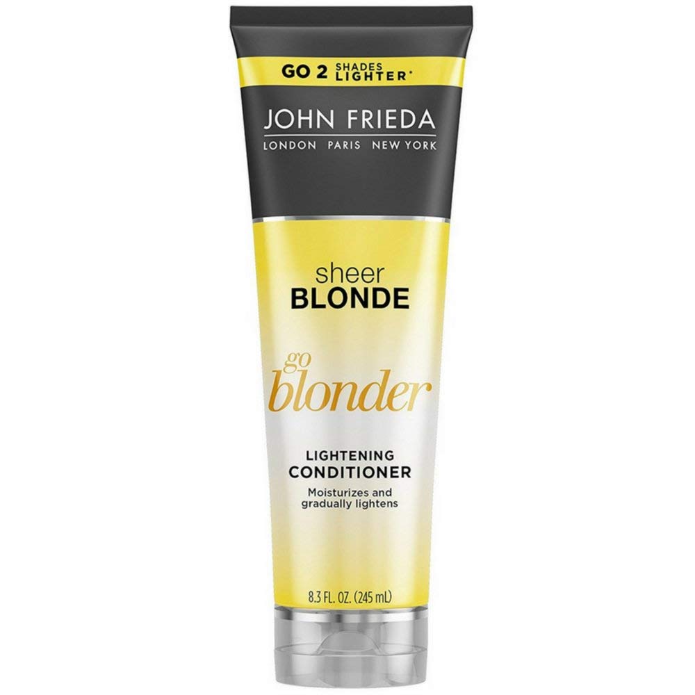 John Frieda front packaging showing 8.3 oz bottle and brightening benefit