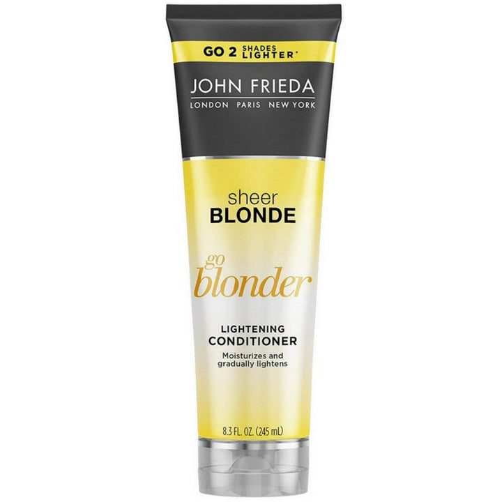 John Frieda front packaging showing 8.3 oz bottle and brightening benefit