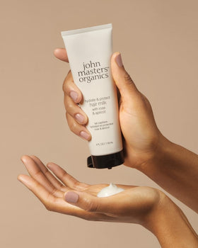 john masters organics bottle in hand for scale showing compact 4 fl oz benefit