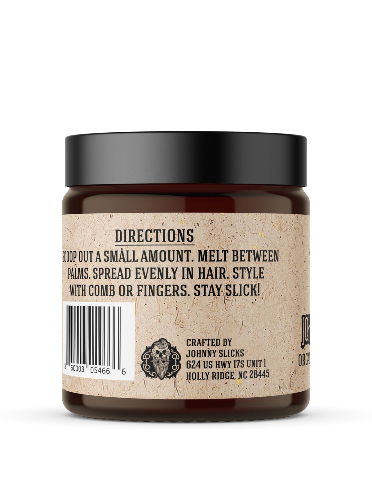 Johnny Slicks pomade warmed in hands ready to apply for controlled styling