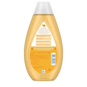 Johnson & Johnson bottle pouring shampoo into palm for gentle lather benefit